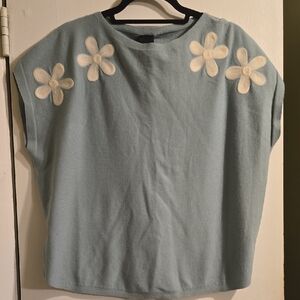 Elegant Blue Women's Sweatshirt with Cream Floral Design